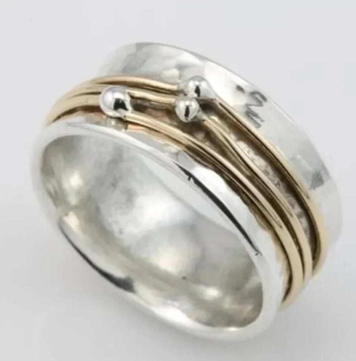 Anello vintage in oro con sovrapposizioni in argento