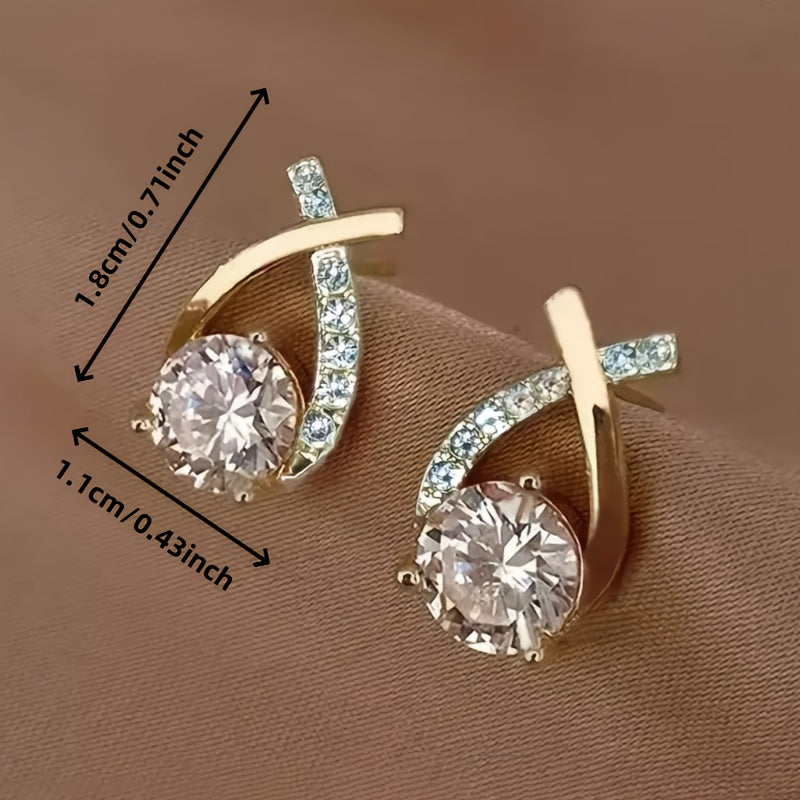 Orecchini a croce in zirconio color oro