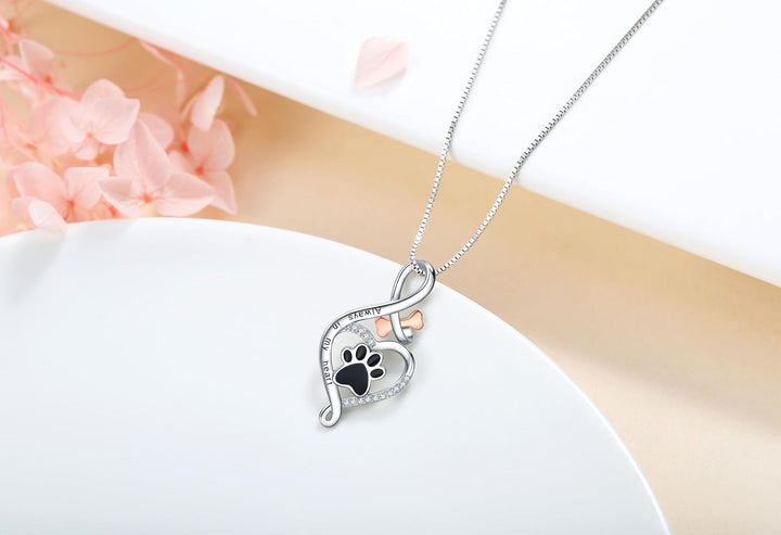 Collana portafortuna con ciondoli a cuore, osso e infinito