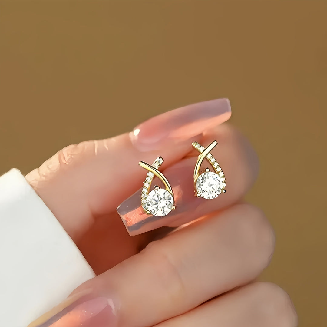 Orecchini a croce in zirconio color oro