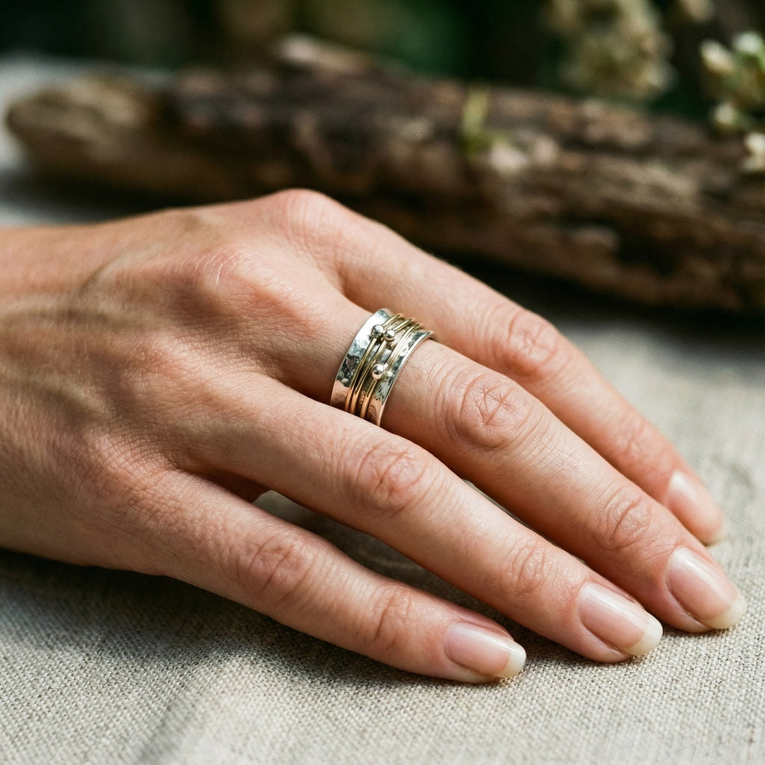 Anello vintage in oro con sovrapposizioni in argento