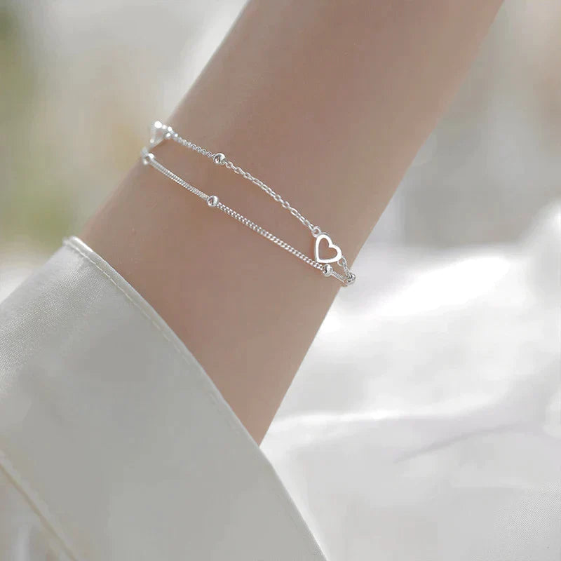 Braccialetto in argento regolabile con ciondolo a forma di cuore