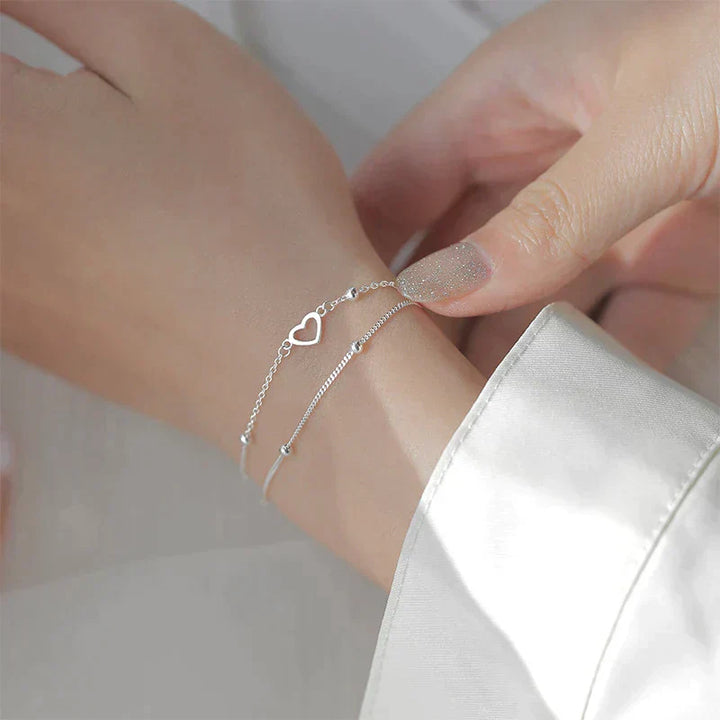 Braccialetto in argento regolabile con ciondolo a forma di cuore