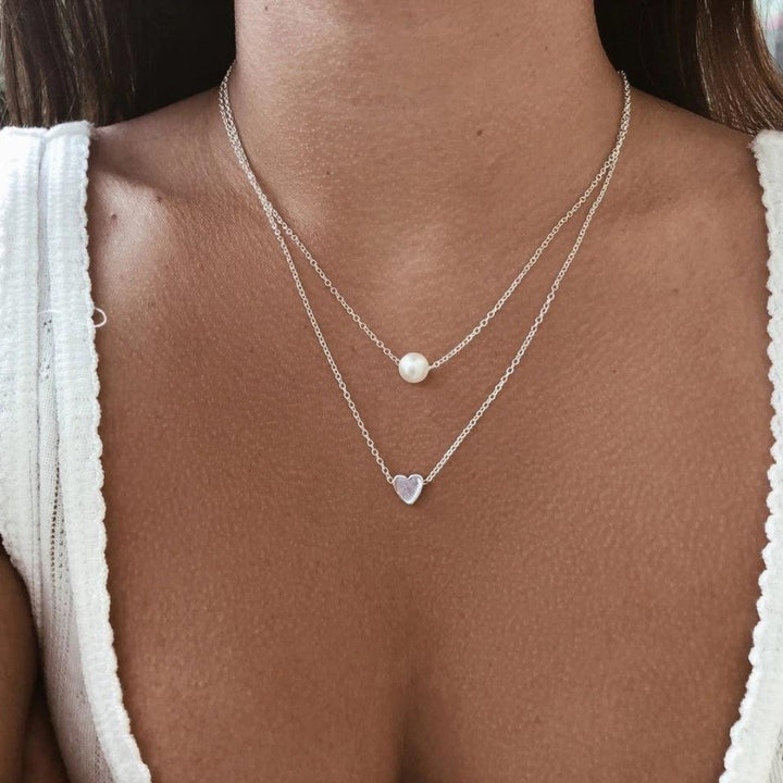 Collana in argento con ciondolo a cuore e perle