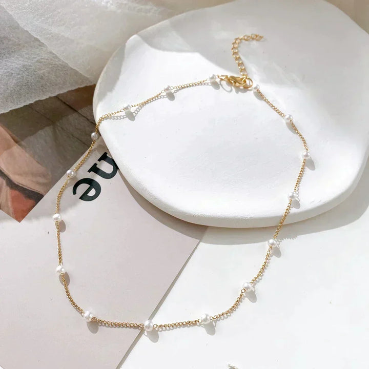Collana con piccole perline dorate