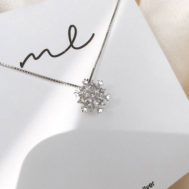 Collana in cristallo con fiocco di neve oro e argento scintillante