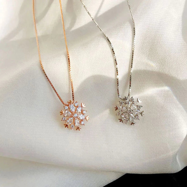 Collana in cristallo con fiocco di neve oro e argento scintillante