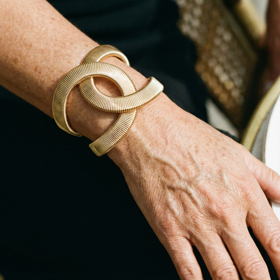 Elegante doppio braccialetto in oro