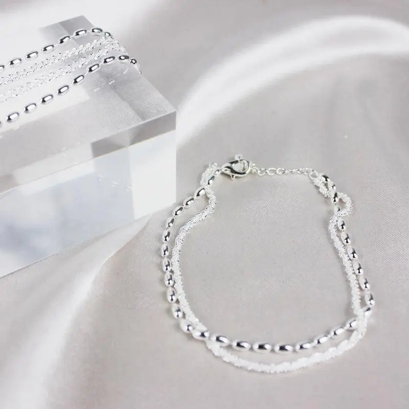 Set braccialetti in argento con zircone