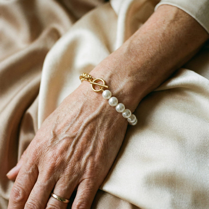 Elegante braccialetto in oro e perle