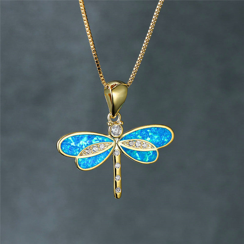 Collana in oro con opale e motivo a libellula