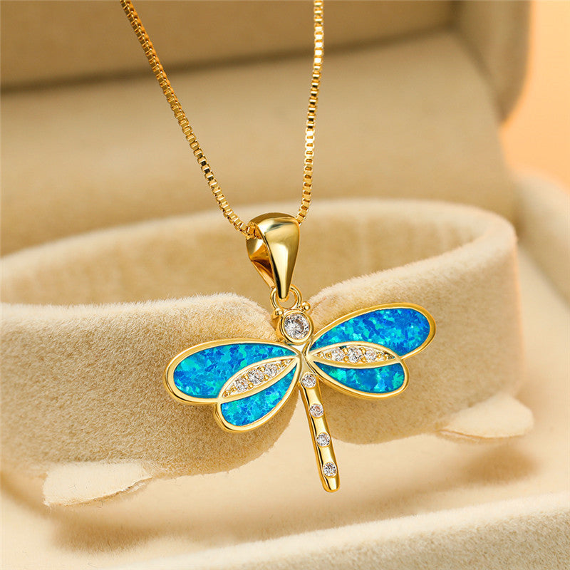 Collana in oro con opale e motivo a libellula