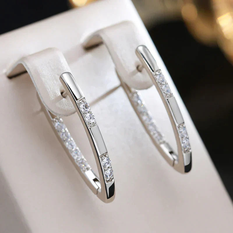 Eleganti orecchini placcati in oro con zirconia