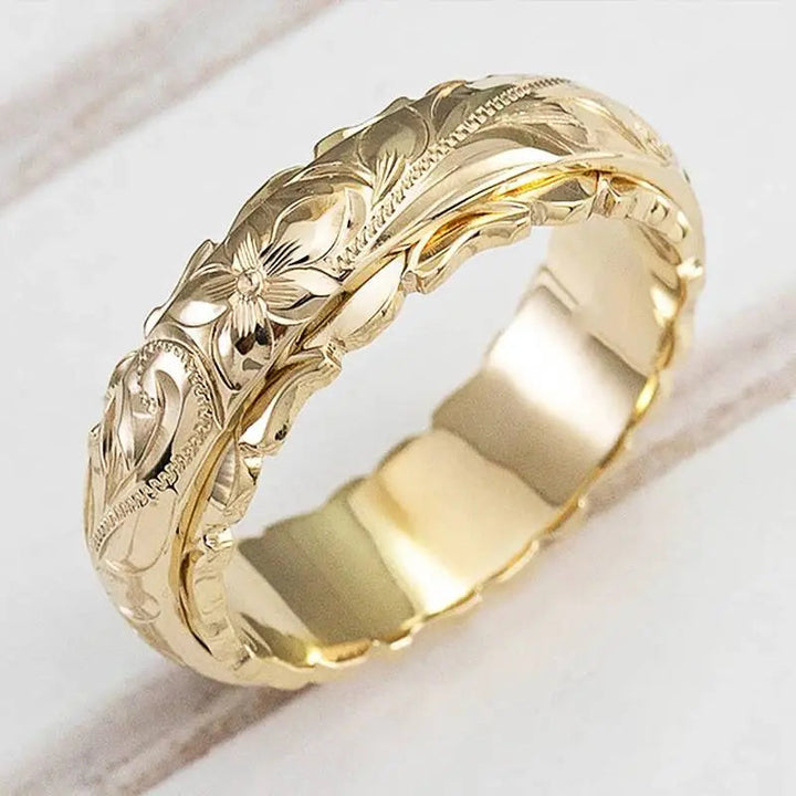 Anello vintage in oro con design floreale