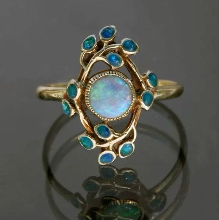 Anello vintage blu con cristalli e opale
